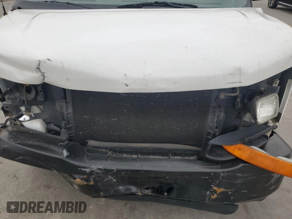 2005 Chevrolet Express Cargo z VIN 1GCFG15T251176760, wystawiony jako Copart lot #42026255 z przebiegiem 265 846 mil mil oraz Szkoda całkowita • Salvage title. Historia ofert i sprzedaży dostępna na DreamBid. Obrazek 11.