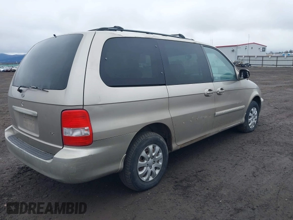 2004 Kia Sedona LX with VIN KNDUP131746563430, listed as a IAAI auction lot 41896386 with 141,526 mi miles. Bid and sale history available at carsss.com. Image 4.