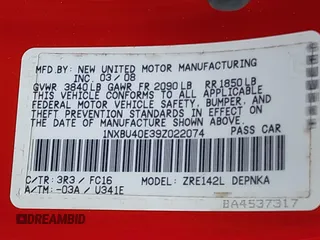 2009 Toyota Corolla with VIN 1NXBU40E39Z022074, listed as a IAAI auction lot 41987902 with 121,206 mi miles. Bid and sale history available at carsss.com. Image 9.
