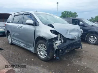 2016 Toyota Sienna XLE with VIN 5TDYK3DC5GS760841, listed as a IAAI auction lot 39797448 with 69,681 mi miles. Bid and sale history available at carsss.com. Image 1.