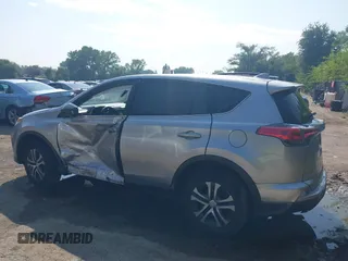 2018 Toyota RAV4 LE with VIN JTMZFREV3JJ161811, listed as a IAAI auction lot 40131640 with 114,330 mi miles. Bid and sale history available at carsss.com. Image 14.