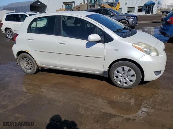 2009 Toyota Yaris with VIN JTDKT923395254782, listed as a Copart auction lot 49500505 with 164,957 mi miles and Salvage Title. Bid and sale history available at carsss.com. Image 4.