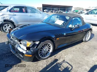 1996 BMW 3-Series Z3 with VIN 4USCH7328TLB67783, listed as a IAAI auction lot 41244966 with 131,901 mi miles. Bid and sale history available at carsss.com. Image 2.