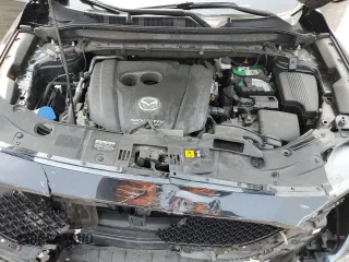2019 Mazda CX-5 Grand Touring with VIN JM3KFBDM2K0569829, listed as a Copart auction lot 59060965 with 99,359 mi miles and Salvage title. Bid and sale history available at DreamBid. Image 12.