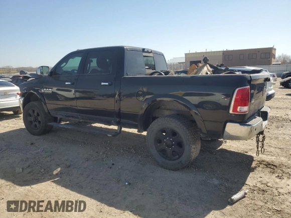 2014 Ram 2500 Laramie with VIN 3C6UR5FL9EG287466, listed as a Copart auction lot 48714275 with 317,145 mi miles and Salvage title. Bid and sale history available at DreamBid. Image 2.