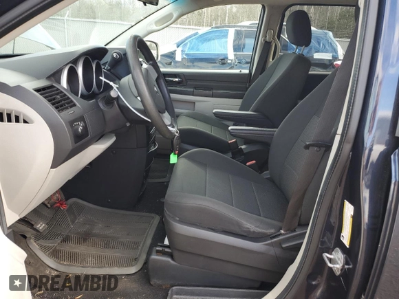 2009 Dodge Grand Caravan SE with VIN 2D8HN44EX9R530854, listed as a Copart auction lot 82131104 with 161,933 mi miles and Salvage title. Bid and sale history available at DreamBid. Image 7.