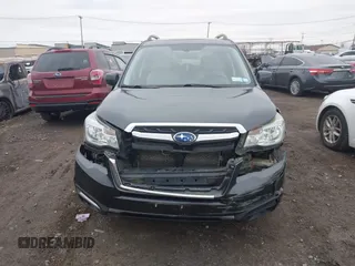 2017 Subaru Forester Premium with VIN JF2SJAEC2HH484525, listed as a IAAI auction lot 41898174 with 140,698 mi miles. Bid and sale history available at carsss.com. Image 6.