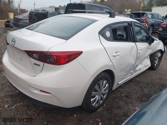 2014 Mazda Mazda3 i Sport with VIN JM1BM1U75E1130979, listed as a IAAI auction lot 41094791 with 100,518 mi miles. Bid and sale history available at carsss.com. Image 4.