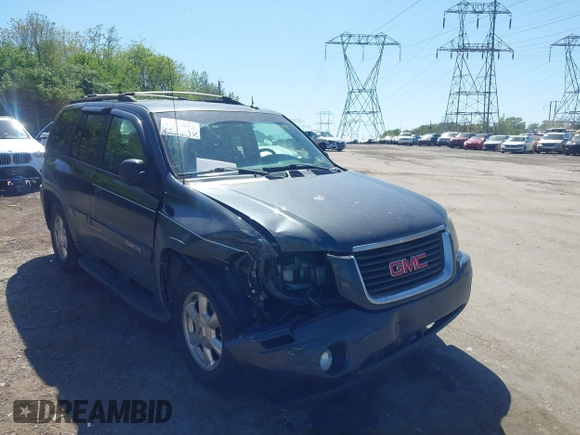 2005 GMC Envoy SLE with VIN 1GKDT13S552253519, listed as a IAAI auction lot 42113617 with 172,058 mi miles and . Bid and sale history available at DreamBid. Image 6.