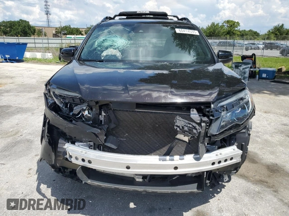 2021 Honda Passport EX-L with VIN 5FNYF7H58MB005187, listed as a Copart auction lot 60414535 with 75,208 mi miles and Salvage title. Bid and sale history available at DreamBid. Image 5.