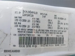 2007 Dodge Grand Caravan with VIN 1D8GP24E77B251383, listed as a IAAI auction lot 41701073 with 226,674 mi miles and . Bid and sale history available at DreamBid. Image 9.