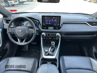 2019 Toyota RAV4 Hybrid XSE with VIN JTMEWRFV5KJ004893, listed as a IAAI auction lot 42772122 with 168,511 mi miles and . Bid and sale history available at DreamBid. Image 6.
