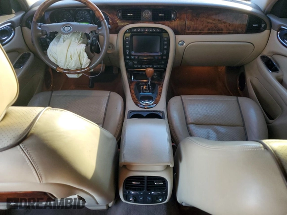 2008 Jaguar XJ Vanden Plas with VIN SAJWA82B18SH28807, listed as a Copart auction lot 42571155 with 97,548 mi miles and Salvage Title. Bid and sale history available at carsss.com. Image 8.