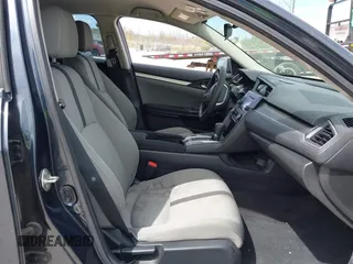 2019 Honda Civic LX with VIN 2HGFC2F61KH564474, listed as a IAAI auction lot 42156385 with 239,694 mi miles and . Bid and sale history available at DreamBid. Image 5.
