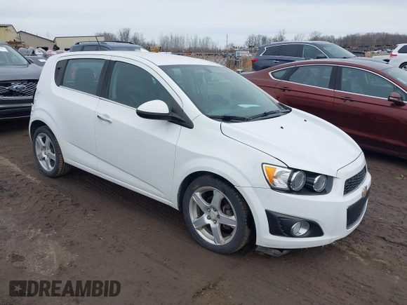 2016 Chevrolet Sonic LTZ z VIN 1G1JE6SB9G4146075, wystawiony jako IAAI lot #41750534 z przebiegiem 103 240 mil mil oraz . Historia ofert i sprzedaży dostępna na DreamBid. Obrazek 1.