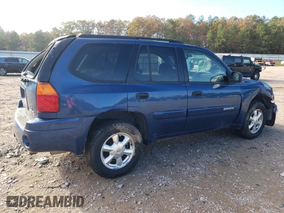 2005 GMC Envoy SLE with VIN 1GKDS13S352369384, listed as a Copart auction lot 79996394 with 117,697 mi miles and Salvage Title. Bid and sale history available at carsss.com. Image 3.