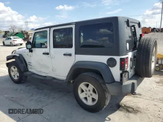 2013 Jeep Wrangler Unlimited Sport z VIN 1C4BJWDG0DL690966, wystawiony jako Copart lot #50554615 z przebiegiem 101 383 mil mil oraz Szkoda całkowita • Salvage title. Historia ofert i sprzedaży dostępna na DreamBid. Obrazek 2.