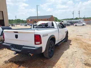 2019 Ram 1500 Classic Warlock with VIN 1C6RR6GT5KS731974, listed as a IAAI auction lot 40018822 with 81,259 mi miles. Bid and sale history available at carsss.com. Image 4.
