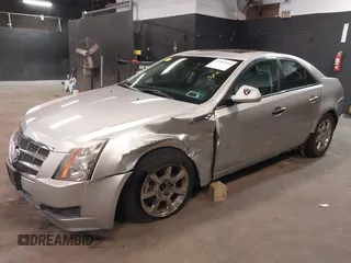 2008 Cadillac CTS RWD with VIN 1G6DM577280123111, listed as a IAAI auction lot 41907644 with 183,085 mi miles and . Bid and sale history available at carsss.com. Image 2.