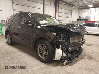 2017 Hyundai Santa Fe 2.4L z VIN 5NMZUDLBXHH041621, wystawiony jako IAAI lot #42194586 z przebiegiem 91 012 mil mil oraz . Historia ofert i sprzedaży dostępna na DreamBid. Obrazek 1.