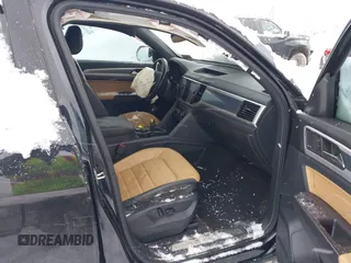 2022 Volkswagen Atlas SEL Premium R-Line with VIN 1V2FE2CA4NC221469, listed as a IAAI auction lot 41236003 with 57,017 mi miles and . Bid and sale history available at DreamBid. Image 5.