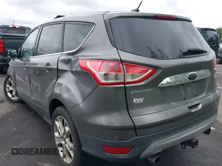 2013 Ford Escape SEL z VIN 1FMCU9H96DUC66206, wystawiony jako IAAI lot #42376442 z przebiegiem 96 776 mil mil oraz . Historia ofert i sprzedaży dostępna na DreamBid. Obrazek 3.
