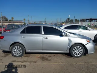 2012 Toyota Corolla L with VIN 2T1BU4EE6CC815435, listed as a IAAI auction lot 41316306 with 122,150 mi miles. Bid and sale history available at carsss.com. Image 13.