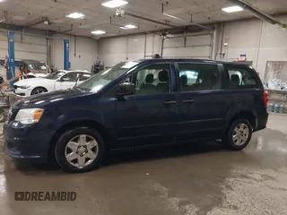 2012 Dodge Grand Caravan SE with VIN 2C4RDGBG8CR367236, listed as a IAAI auction lot 40041863 with 166,555 mi miles and . Bid and sale history available at DreamBid. Image 14.