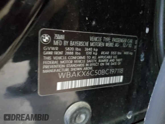 2011 BMW 7 Series with VIN WBAKX6C50BC197118, listed as a Copart auction lot 73686234 with 166,393 mi miles and Clean title. Bid and sale history available at DreamBid. Image 12.