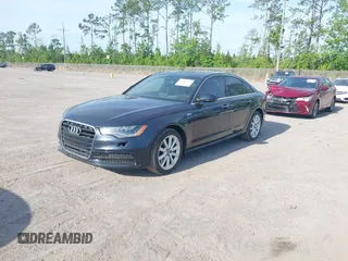 2015 Audi A6 3.0T Prestige with VIN WAUHGAFC3FN011654, listed as a IAAI auction lot 42104153 with 166,719 mi miles. Bid and sale history available at carsss.com. Image 17.