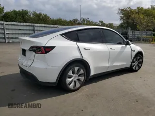 2020 Tesla Model Y Long Range z VIN 5YJYGDEE2LF049815, wystawiony jako Copart lot #53738165 z przebiegiem 113 779 mil mil oraz Szkoda całkowita • Salvage title. Historia ofert i sprzedaży dostępna na DreamBid. Obrazek 3.
