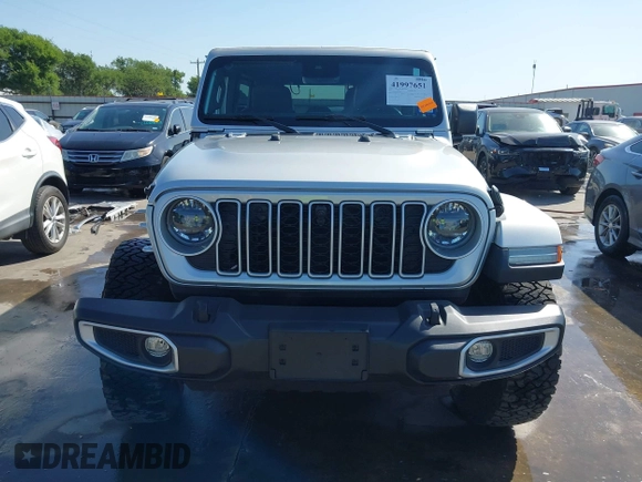 2024 Jeep Wrangler Sahara with VIN 1C4PJXEN7RW103564, listed as a IAAI auction lot 41997651 with 16,529 mi miles and . Bid and sale history available at carsss.com. Image 20.
