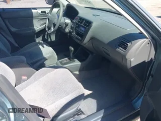 1999 Honda Civic LX z VIN 2HGEJ667XXH575496, wystawiony jako IAAI lot #42372107 z przebiegiem 175 154 mil mil oraz . Historia ofert i sprzedaży dostępna na DreamBid. Obrazek 5.