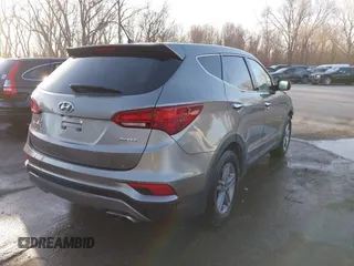 2018 Hyundai Santa Fe Sport 2.4L with VIN 5NMZT3LB6JH067040, listed as a IAAI auction lot 41760708 with 101,302 mi miles. Bid and sale history available at carsss.com. Image 4.