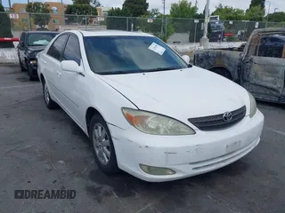 2003 Toyota Camry LE with VIN JTDBE32K530180834, listed as a IAAI auction lot 42255688 with 134,594 mi miles and . Bid and sale history available at DreamBid. Image 6.