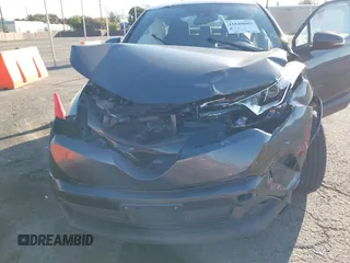 2018 Toyota C-HR XLE with VIN NMTKHMBX3JR009940, listed as a IAAI auction lot 41840885 with 71,155 mi miles. Bid and sale history available at carsss.com. Image 6.