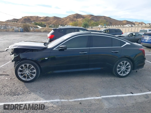 2022 Cadillac CT5 Premium Luxury z VIN 1G6DN5RK8N0118974, wystawiony jako IAAI lot #41265623 z przebiegiem 40 568 mil mil oraz . Historia ofert i sprzedaży dostępna na DreamBid. Obrazek 14.