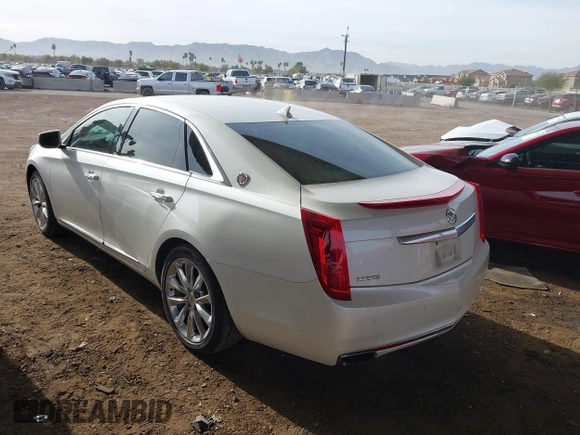 2014 Cadillac XTS Luxury with VIN 2G61M5S35E9199253, listed as a IAAI auction lot 41400558 with 112,955 mi miles. Bid and sale history available at carsss.com. Image 3.