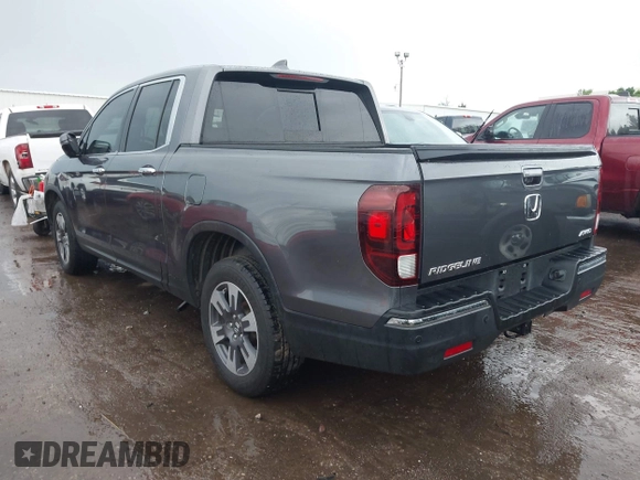 2018 Honda Ridgeline RTL-E with VIN 5FPYK3F74JB012181, listed as a IAAI auction lot 42143197 with 117,520 mi miles and . Bid and sale history available at DreamBid. Image 3.