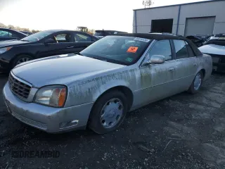 2002 Cadillac DeVille DHS z VIN 1G6KE57Y02U304933, wystawiony jako Copart lot #86919134 z przebiegiem Nie podano mil oraz Tytuł czysty. Historia ofert i sprzedaży dostępna na DreamBid. Obrazek 1.