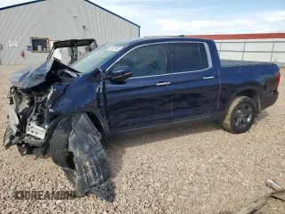 2022 Honda Ridgeline RTL-E z VIN 5FPYK3F74NB016933, wystawiony jako Copart lot #52349145 z przebiegiem 61 710 mil mil oraz Szkoda całkowita • Salvage title. Historia ofert i sprzedaży dostępna na DreamBid. Obrazek 1.
