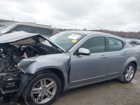 2013 Dodge Avenger SXT with VIN 1C3CDZCB2DN665997, listed as a IAAI auction lot 42011394 with Not Provided miles and . Bid and sale history available at carsss.com. Image 14.