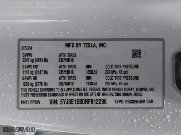 2024 Tesla Model 3 Long Range with VIN 5YJ3E1EB0RF812296, listed as a IAAI auction lot 41799217 with 6,990 mi miles. Bid and sale history available at carsss.com. Image 9.