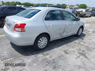 2010 Toyota Yaris with VIN JTDBT4K30A4067769, listed as a IAAI auction lot 42072347 with 266,213 mi miles. Bid and sale history available at carsss.com. Image 4.