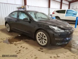 2022 Tesla Model 3 with VIN 5YJ3E1EA2NF336151, listed as a Copart auction lot 50795245 with 14,265 mi miles and Salvage Title. Bid and sale history available at carsss.com. Image 4.
