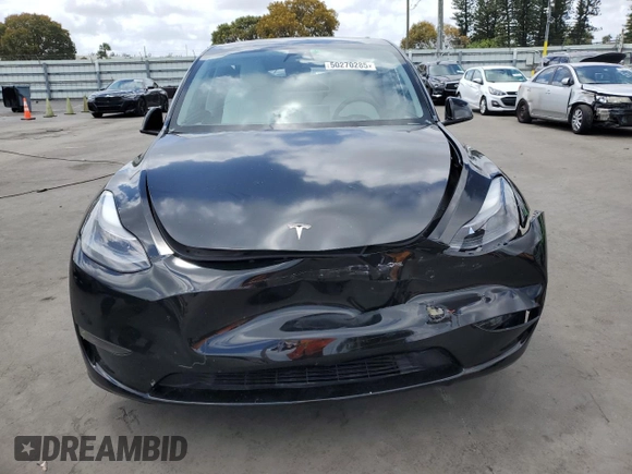 2023 Tesla Model Y Performance with VIN 7SAYGDEF8PF762915, listed as a Copart auction lot 50270285 with 23,893 mi miles and Salvage Title. Bid and sale history available at DreamBid. Image 5.