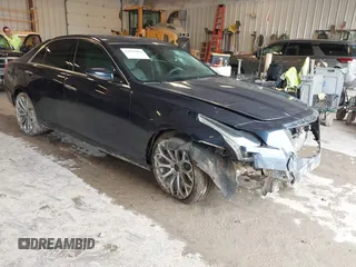 2015 Cadillac CTS AWD z VIN 1G6AW5SXXF0136481, wystawiony jako IAAI lot #42173024 z przebiegiem 128 984 mil mil oraz . Historia ofert i sprzedaży dostępna na DreamBid. Obrazek 1.