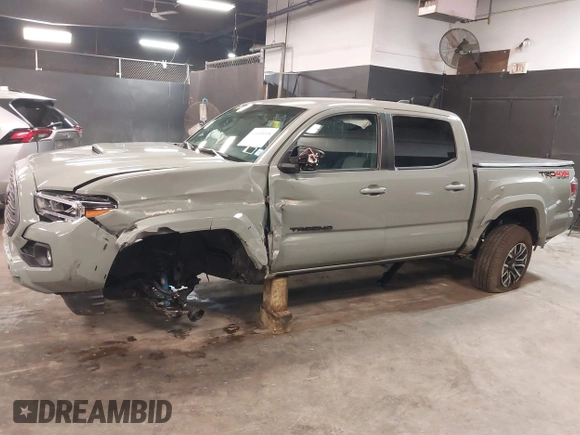 2023 Toyota Tacoma 4WD SR with VIN 3TMCZ5ANXPM607489, listed as a IAAI auction lot 41605018 with 15,229 mi miles. Bid and sale history available at carsss.com. Image 14.