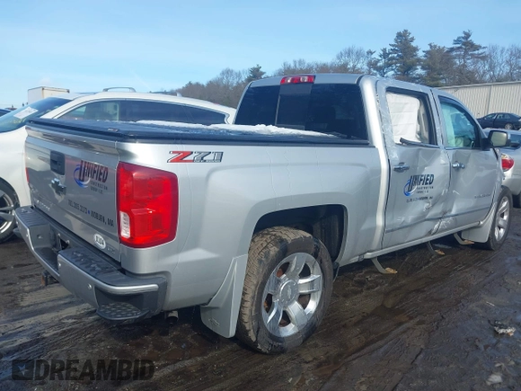 2018 Chevrolet Silverado 1500 LTZ with VIN 3GCUKSECXJG536316, listed as a IAAI auction lot 41432469 with 127,276 mi miles. Bid and sale history available at carsss.com. Image 4.