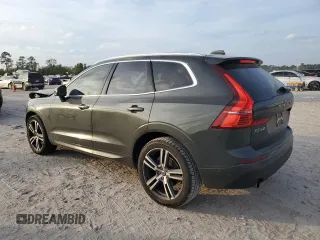 2018 Volvo XC60 Momentum with VIN LYV102RK0JB106389, listed as a Copart auction lot 82677454 with 114,832 mi miles and Salvage Title. Bid and sale history available at carsss.com. Image 2.